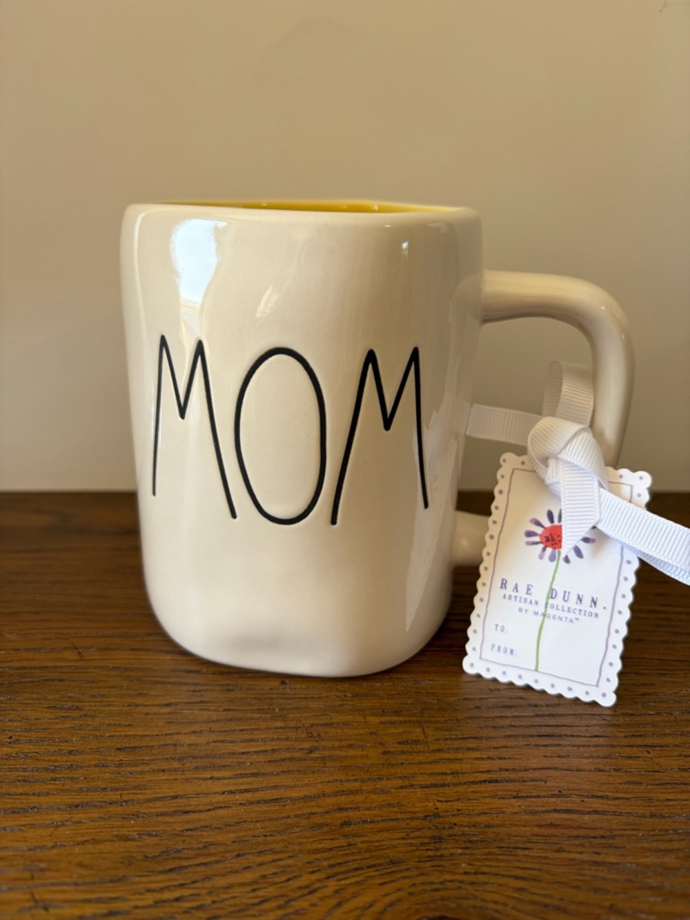 Brand new Rae Dunn “MOM” Ceramic Mug with Hawaiian hibiscus, double sided.